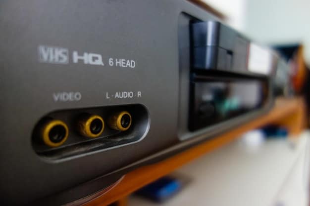A close-up photo of various HDMI ports on the back of a smart TV, highlighting the different HDMI versions (e.g., HDMI 2.0, HDMI 2.1) and their corresponding labels. Cables are partially plugged in to show connectivity.