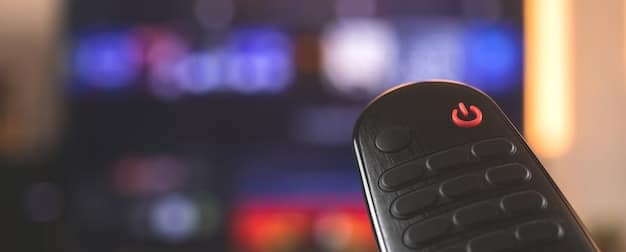 A close-up of a smart TV remote with several buttons highlighted, including the microphone button. Focus on the remote emphasizes control and potential privacy settings.