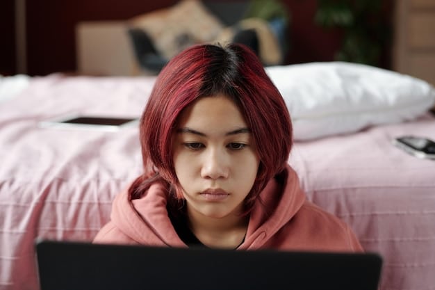 A person watching a K-Drama on their laptop with tears in their eyes, demonstrating the strong emotional connection that viewers often have with the storylines and OSTs.
