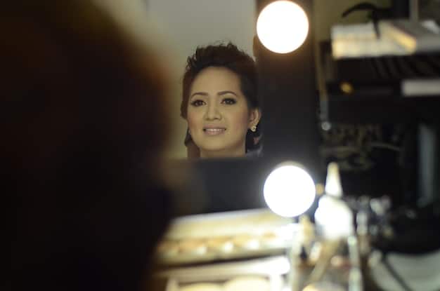 A behind-the-scenes photo showing a famous K-drama actor filming a cameo appearance on the set of another drama. The atmosphere is lighthearted and collaborative, with the cameo actor interacting positively with the main cast and crew.