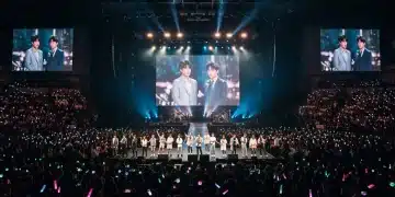 Energetic K-Drama OST concert in a US arena with a cheering crowd.